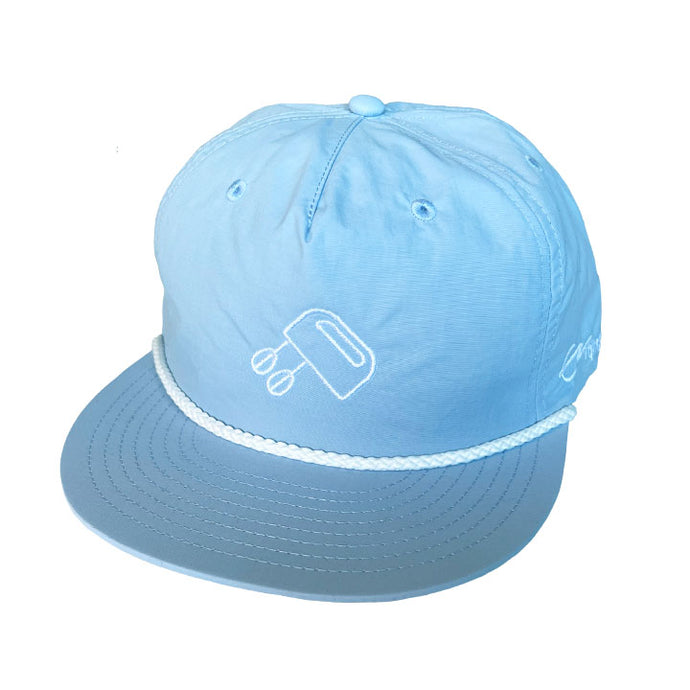 Sky Blue Rope Cap with white with Tjing Ambassador Elvis Eriksson Sveiven's personal logo embroidery on the front panel and signature on the side rim. Single panel at front, quick dry fabric, plastic snapback, tonal under-peak lining - one size fits all.