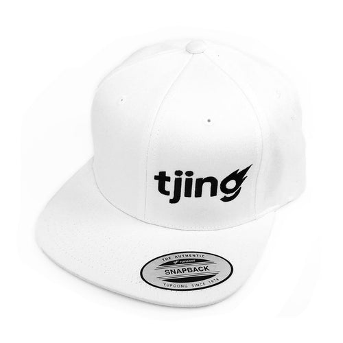 White hat with black Tjing logo embroidery on the side front panel, snapback enclosure in the back – one size fits most.